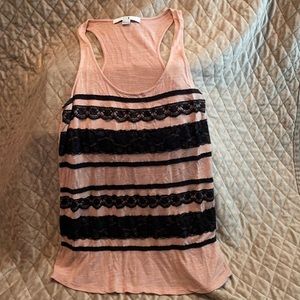 5 for $25! Soft pink razor back tank with black lace detail.